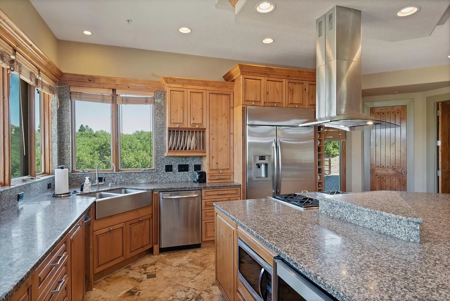 large kitchen with marble countertop